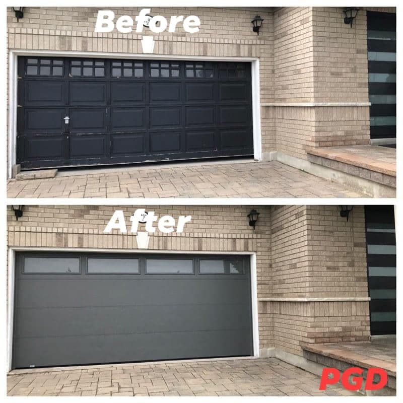 Before and after: a black raised-panel double garage door with divided windows, replaced with a grey flat-faced door with a row of frosted windows along the top.