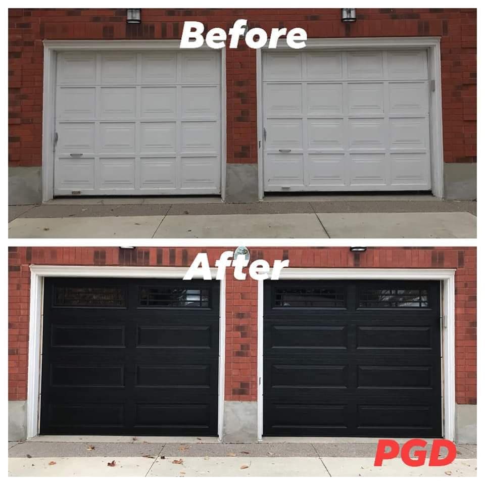 Before and after: two white raised-panel garage doors in a red brick wall, replaced with two black long-panel doors with divided windows along the top.