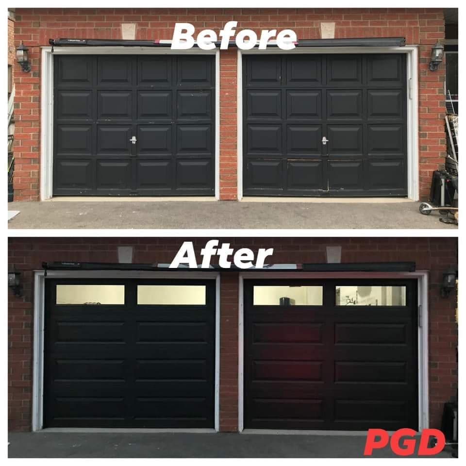 Before and after: two black raised-panel garage doors in a red brick wall, replaced with two black long-panel doors with two windows across the top.